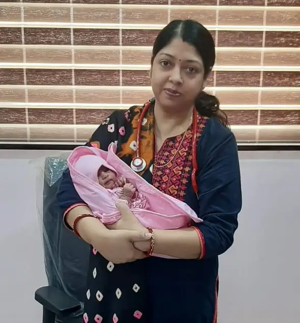 Dr. Mamta Singh With a new born baby